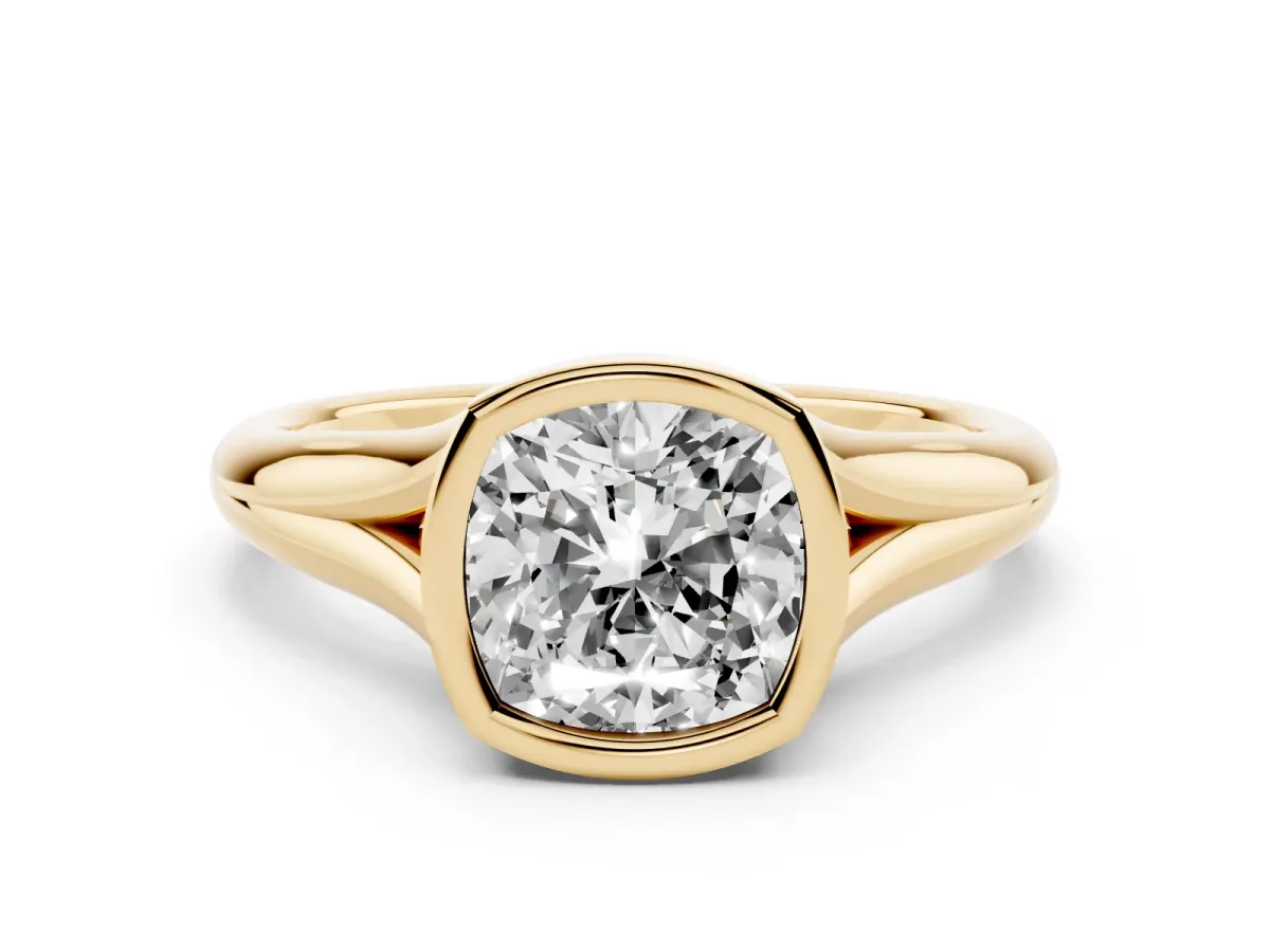 Bezel Set Cushion Cut Solitaire Diamond Ring with Smooth Band Yellow gold
