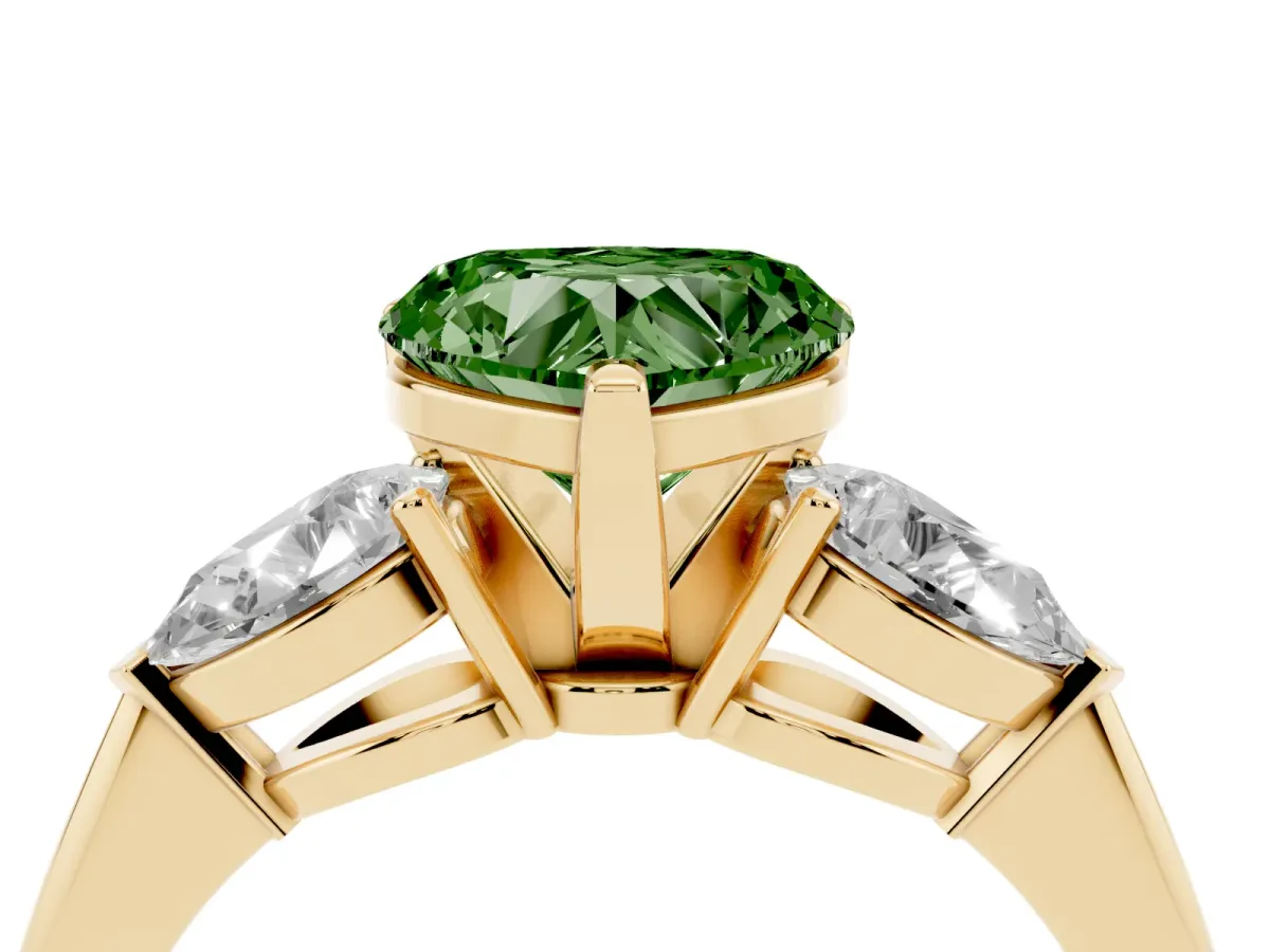 Fancy Green Three-Stone Heart Cut Diamond Ring with Pear Side Stones and Four-Prong Setting Yellow gold