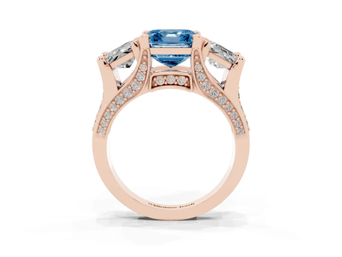 Fancy Blue Asscher Cut Diamond Three-Stone Ring with Channel Set Band and Four-Prong Setting Rose gold