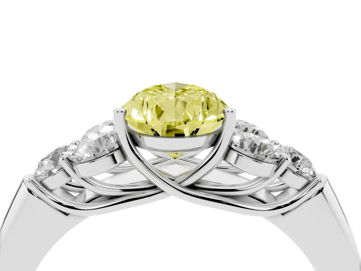Fancy Yellow Pear Cut Cut Diamond Cluster Ring with Round Accent Stones and Prong Setting on a Classic Band Silver