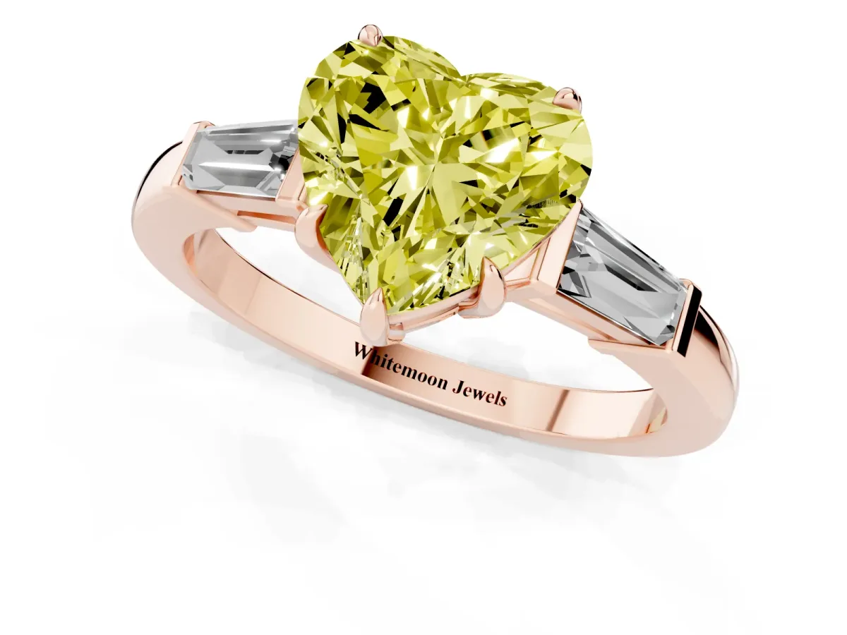 Fancy Yellow Heart Cut Diamond Three-Stone Ring with Tapered Baguette Side Stones and Prong Setting Rose gold
