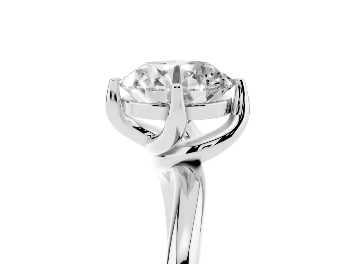 Round Cut Diamond Solitaire Engagement Ring with Four-Prong Setting and Classic Band Silver