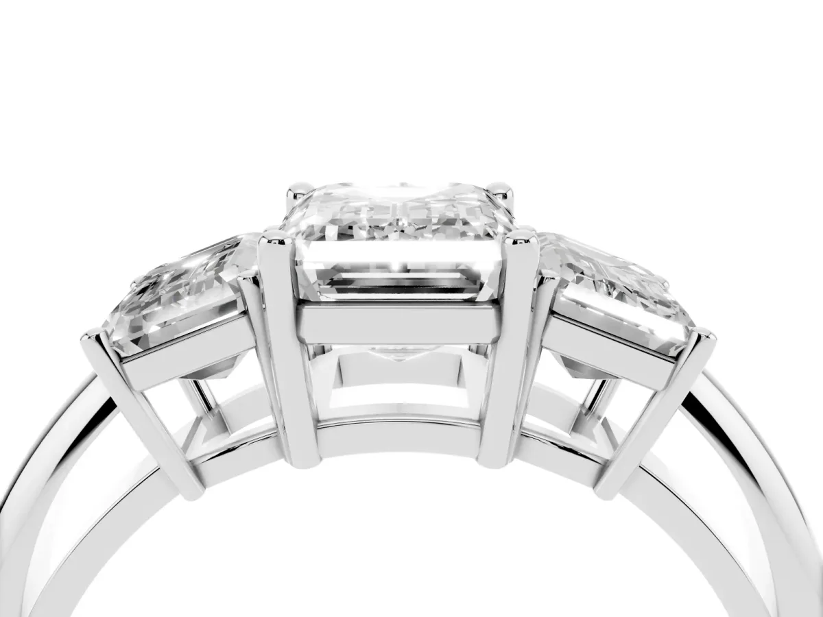 Three-Stone Emerald Cut Cut Diamond Engagement Ring with Prong Setting on a White Gold Band Platinum