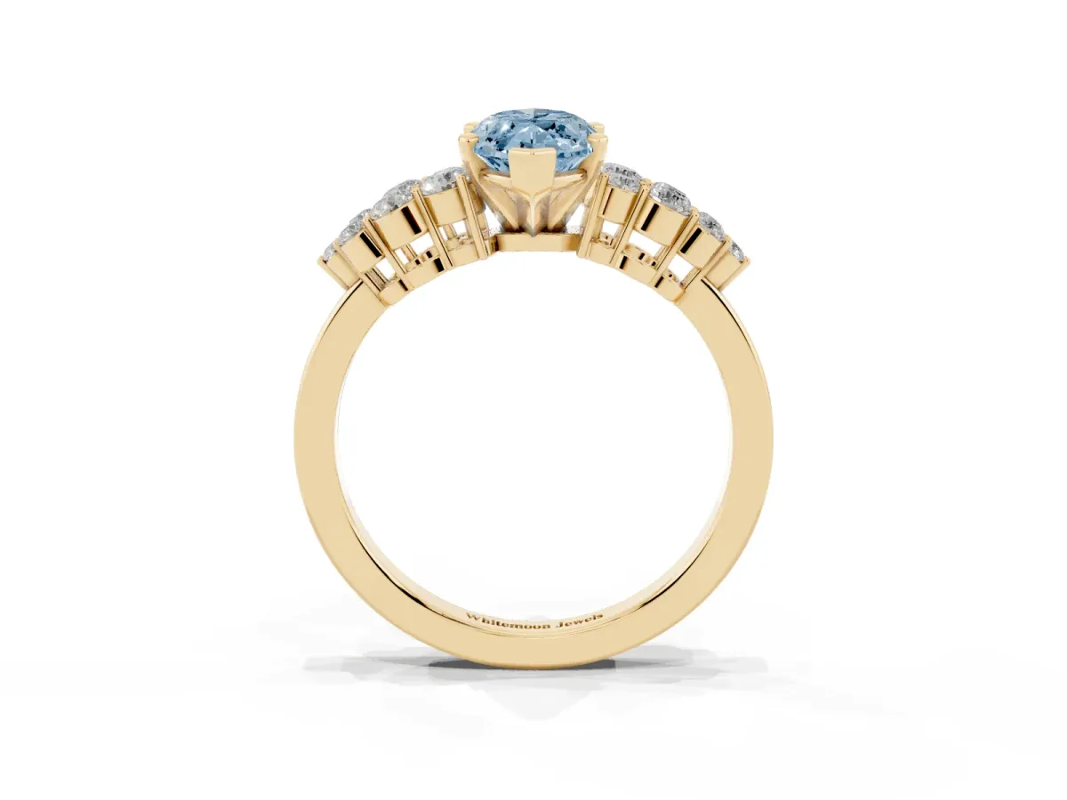 Fancy Blue Marquise Cut Cluster Diamond Engagement Ring with Pavé Band and Four-Prong Setting Yellow gold