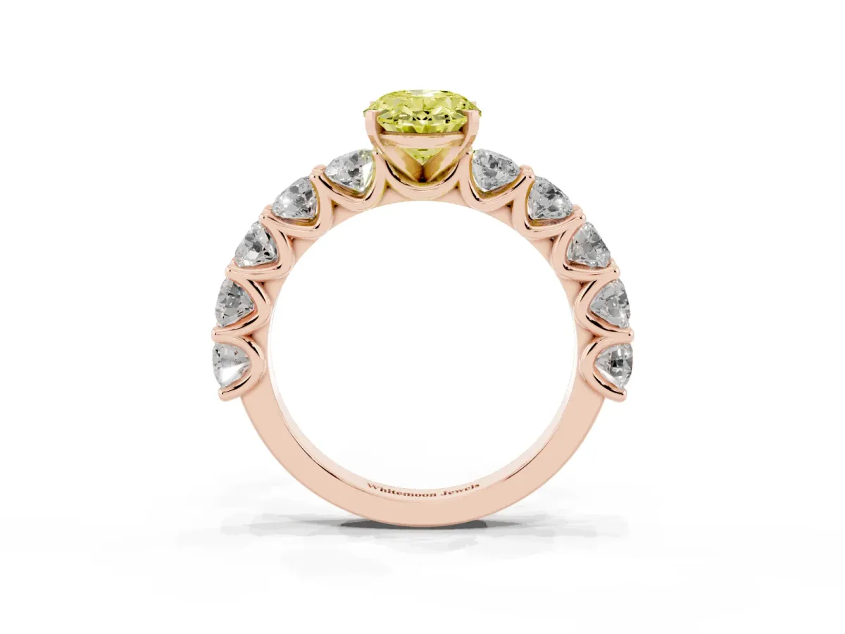 Fancy Yellow Oval Cut Diamond Prong Setting with Side Stones on a Pave Band Rose gold