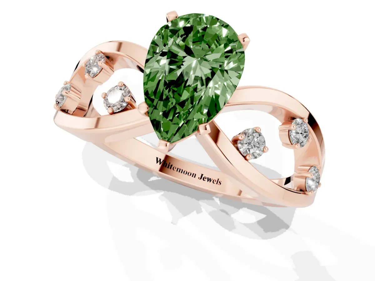 Fancy Green Pear Cut Cut Solitaire Diamond with Side Stones on Criss-Cross Band and Four-Prong Setting Rose gold