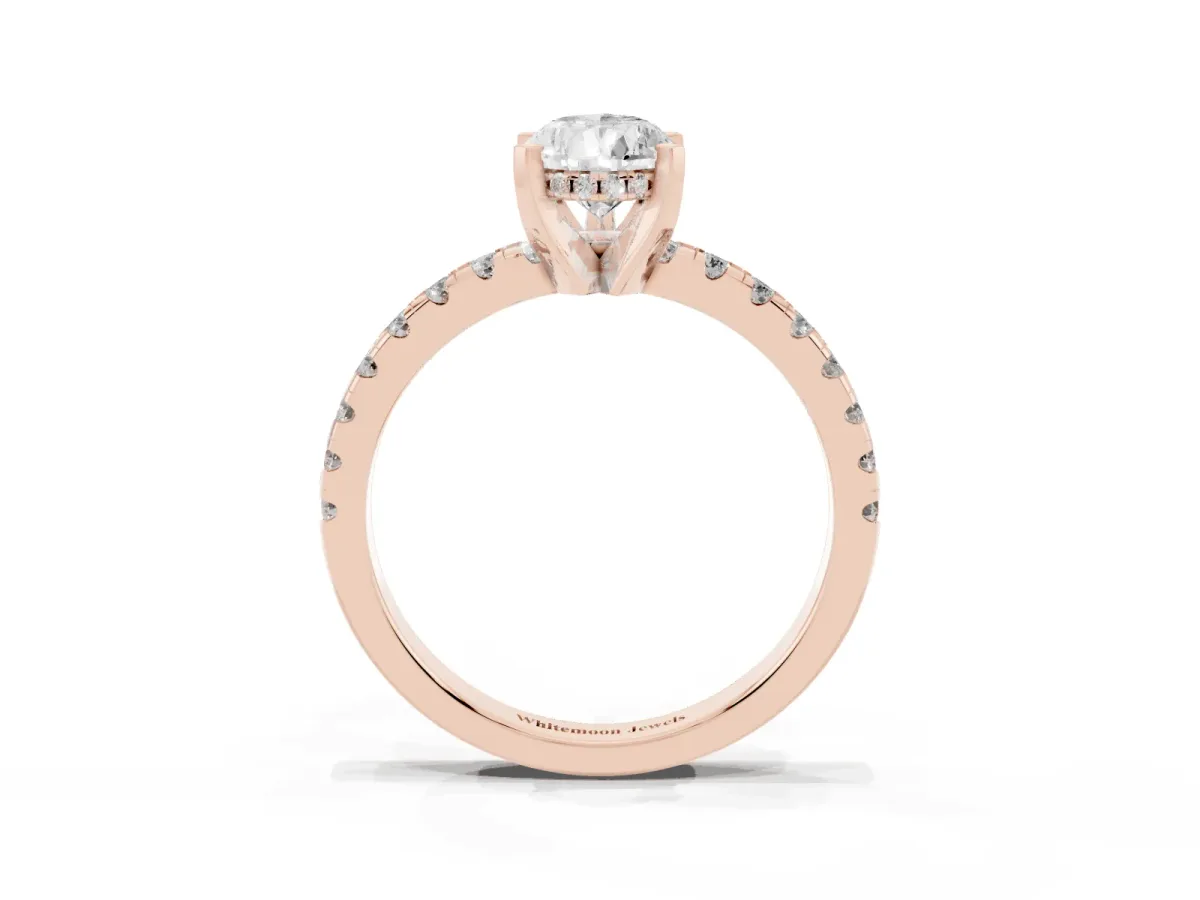 Pear Cut Diamond Solitaire Ring with Round Pavé Band and Four-Prong Setting Rose gold