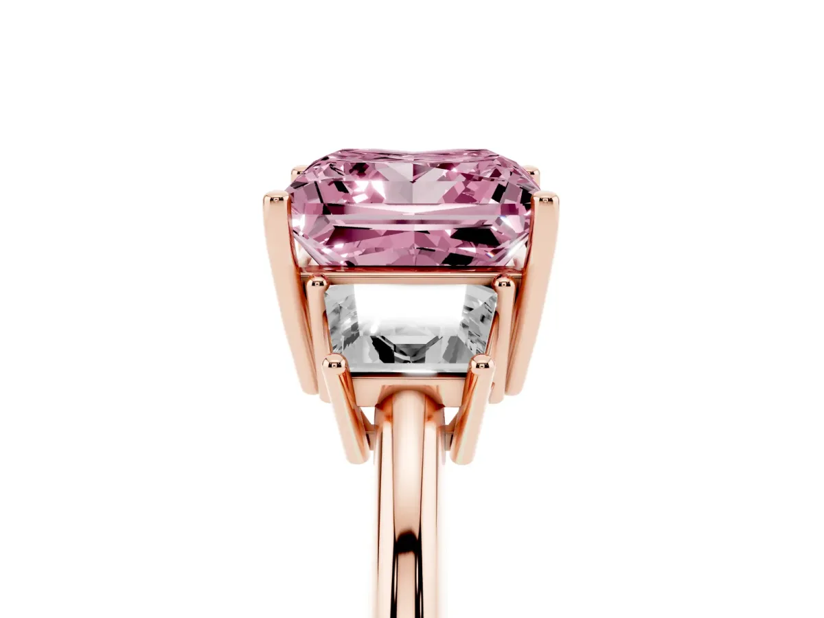 Fancy Pink Princess Cut Diamond Three-Stone Ring with Trapezoid Side Stones and Prong Setting Rose gold