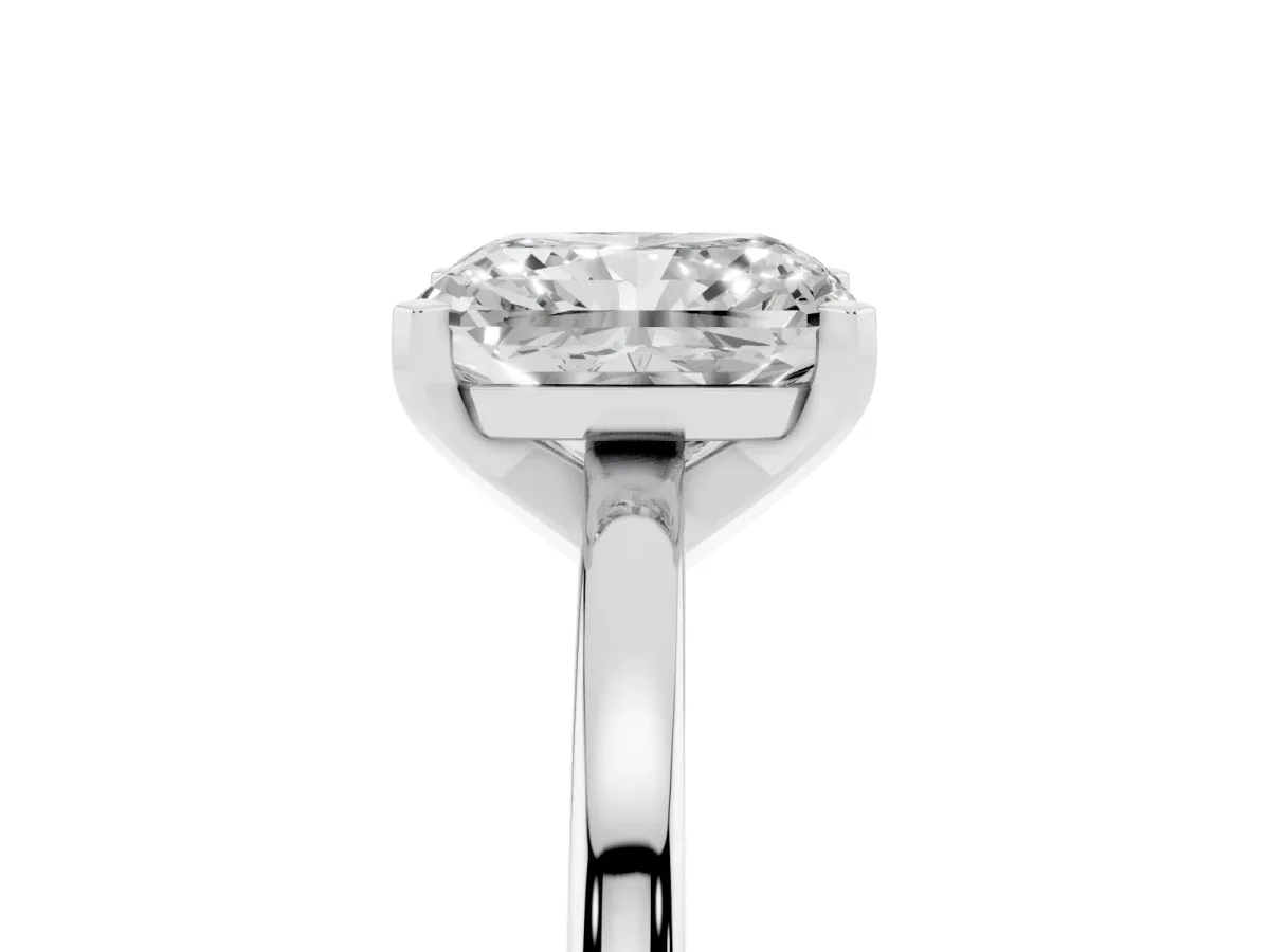 Radiant Cut Solitaire Diamond Engagement Ring with Four-Prong Setting on a Classic Band Silver