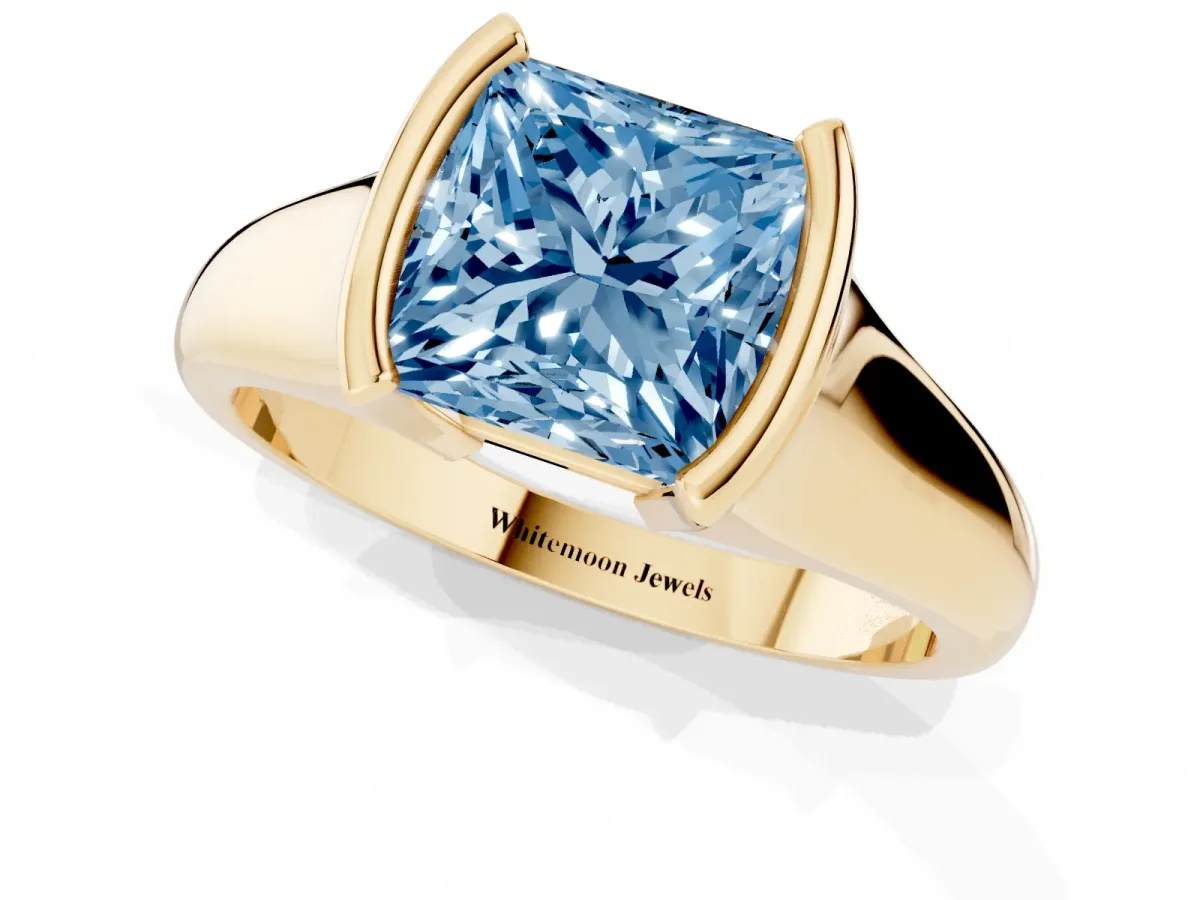 Fancy Blue Princess Cut Solitaire Tension Set Diamond Ring with Split Shank Band Yellow gold