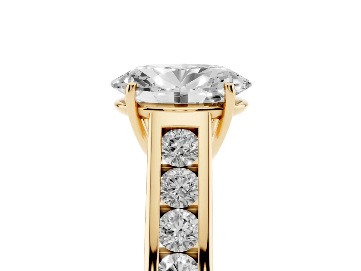 Oval Cut Solitaire Channel-Set Diamond Engagement Ring with Four-Prong Setting Yellow gold
