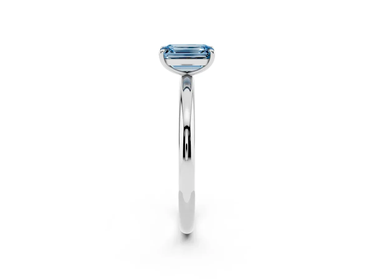 Fancy Blue Emerald Cut Solitaire Diamond Ring with Four-Prong Setting on a Plain Band White gold