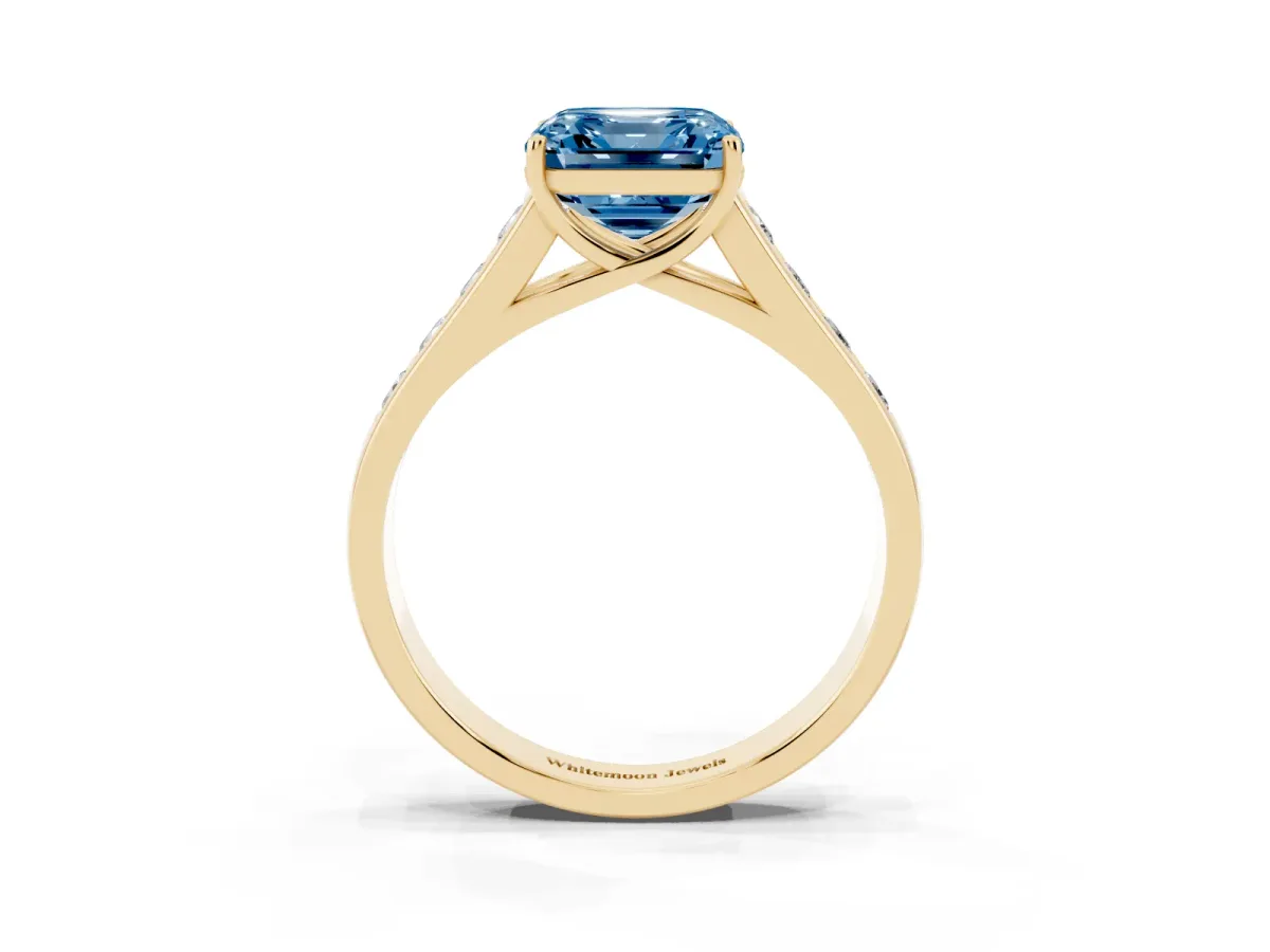 Fancy Blue Asscher Cut Solitaire Channel-Set Diamond Engagement Ring with Four-Prong Setting Yellow gold