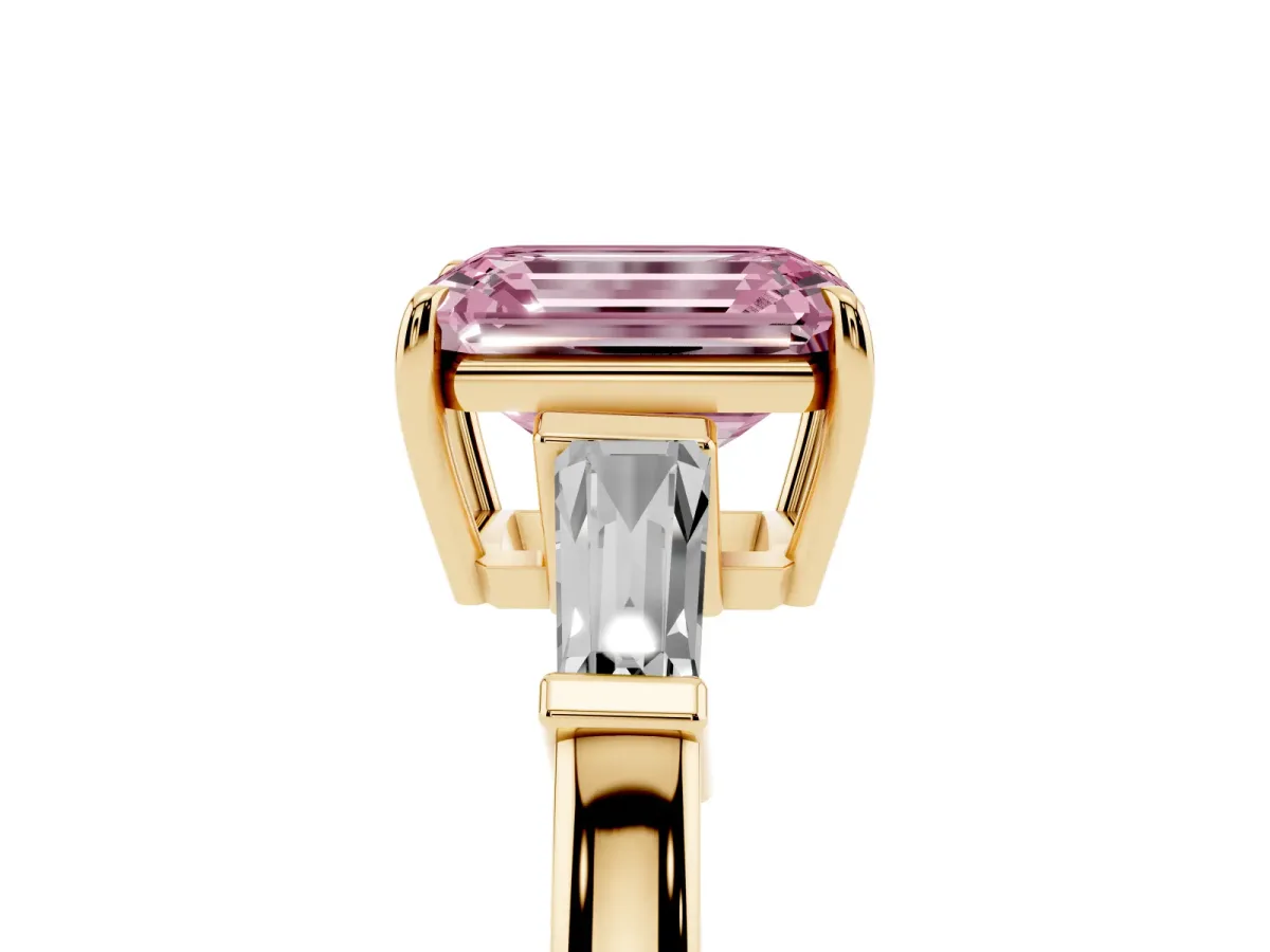 Fancy Pink Emerald Cut Diamond Three-Stone Ring with Tapered Baguette Side Stones and Prong Setting Yellow gold