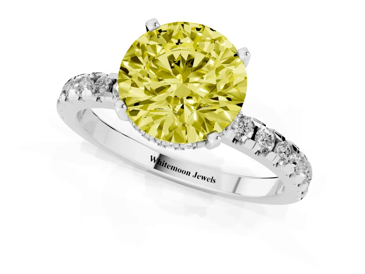 Fancy Yellow Round Cut Diamond Solitaire Ring with Round Pavé Band and Four-Prong Setting Silver