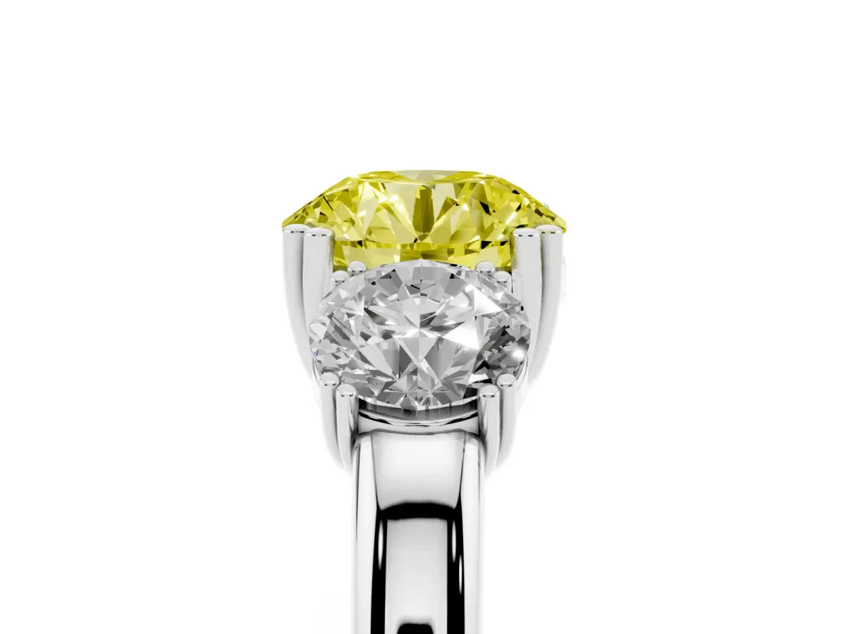 Fancy Yellow Three-Stone Round Cut Cut Diamond Ring with Channel Set Band and Four-Prong Setting Platinum