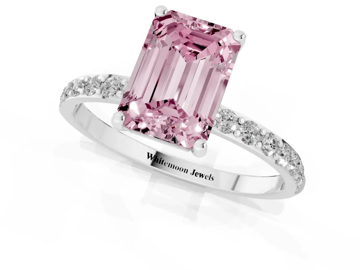Fancy Pink Emerald Cut Diamond Solitaire Ring with Round Pavé Shoulders and Prong Setting Platinum