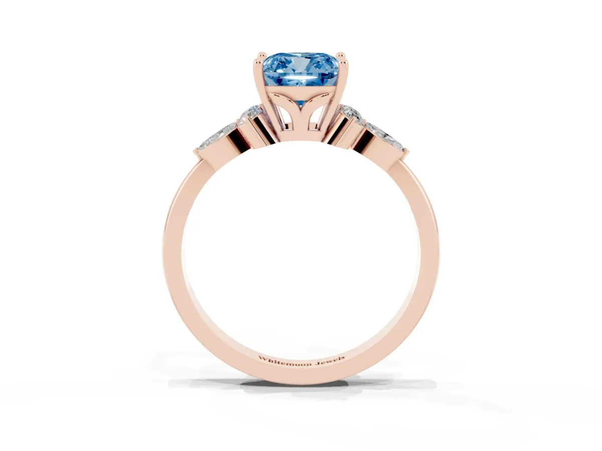 Fancy Blue Cushion Cut Brilliant Diamond Solitaire Ring with Pear Side Stones and Four-Prong Setting Rose gold
