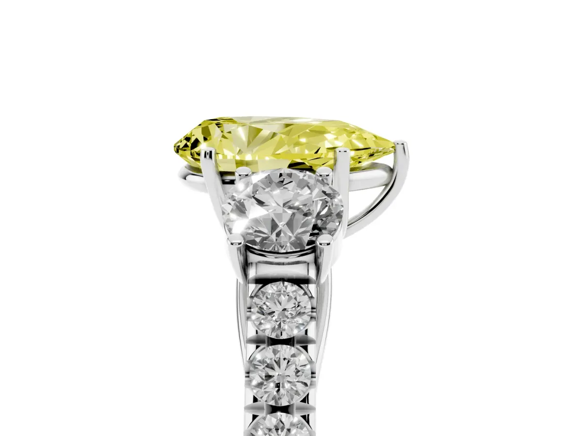 Fancy Yellow Pear Cut Cut Diamond Three-Stone Ring with Round Side Stones and Pavé Band Silver