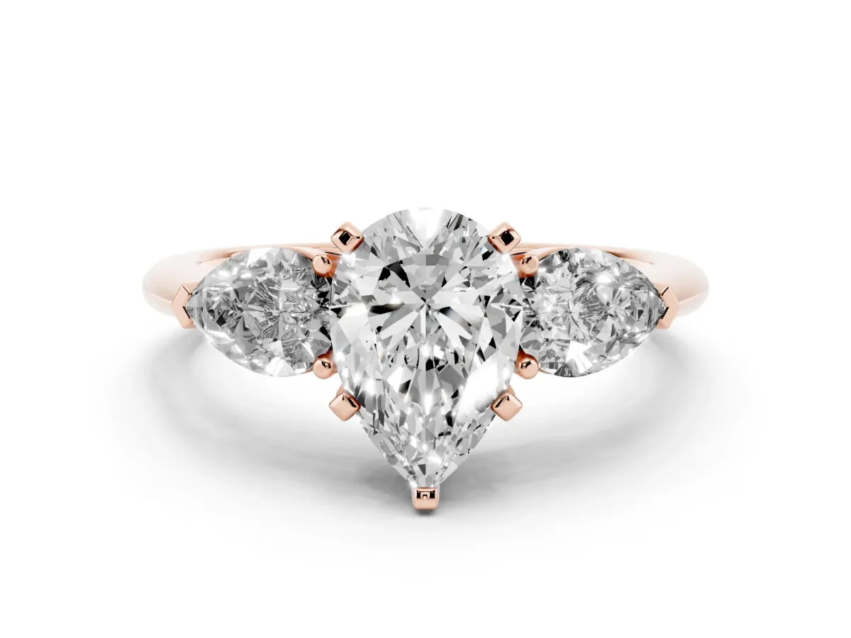 Three-Stone Pear Cut Diamond Ring with Pear Side Stones and Four-Prong Setting Rose gold