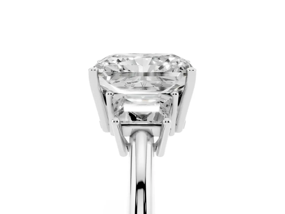Radiant Cut Diamond Three-Stone Ring with Trapezoid Side Stones and Prong Setting Platinum