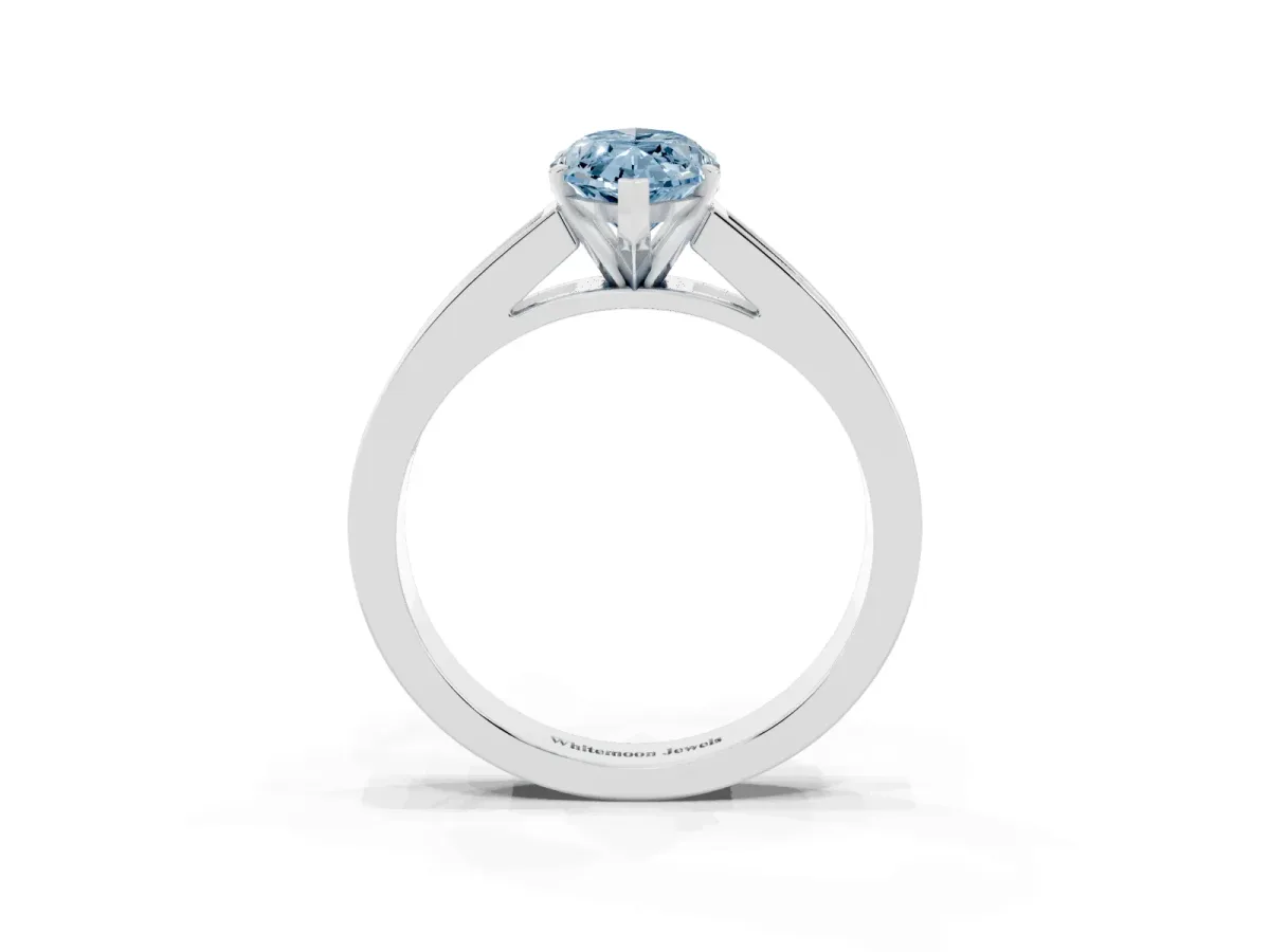 Fancy Blue Marquise Cut Solitaire Diamond Ring with Channel-Set Band and Four-Prong Setting Silver