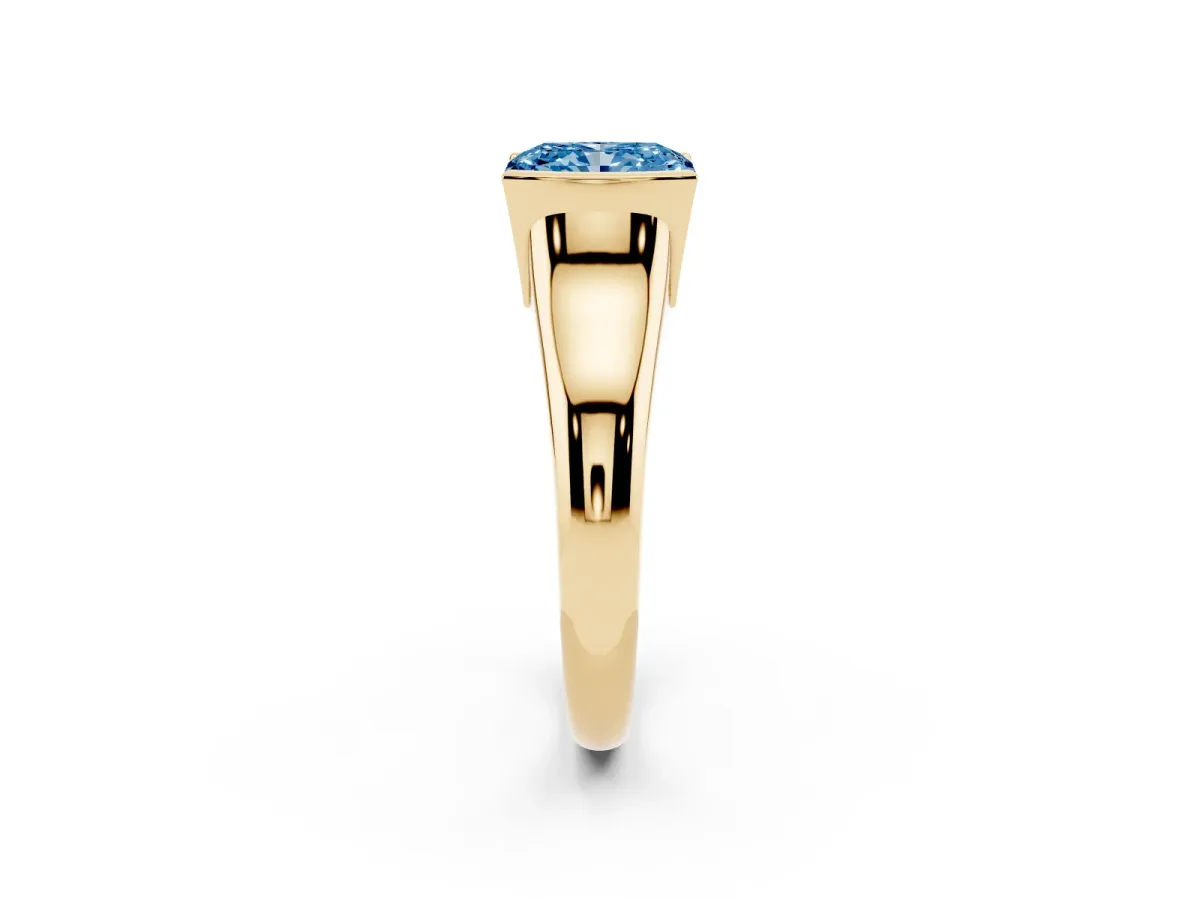 Fancy Blue Radiant Cut Solitaire Tension Set Diamond Ring with Split Shank Band Yellow gold