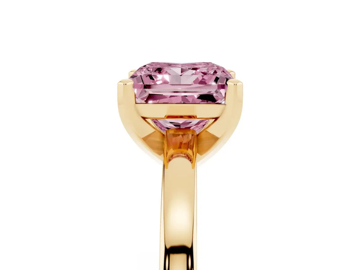 Fancy Pink Princess Cut Solitaire Diamond Engagement Ring with Four-Prong Setting on a Classic Band Yellow gold