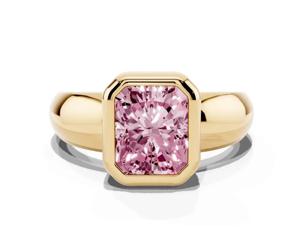 Fancy Pink Bezel Set Radiant Cut Solitaire Ring with Wide Band Yellow gold