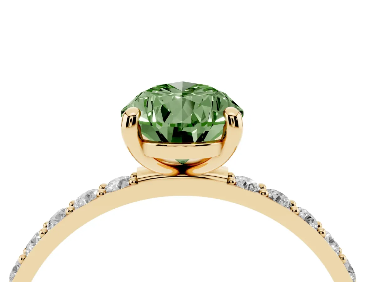 Fancy Green Pear Cut Diamond Solitaire Ring with Round Pavé Band and Prong Setting Yellow gold