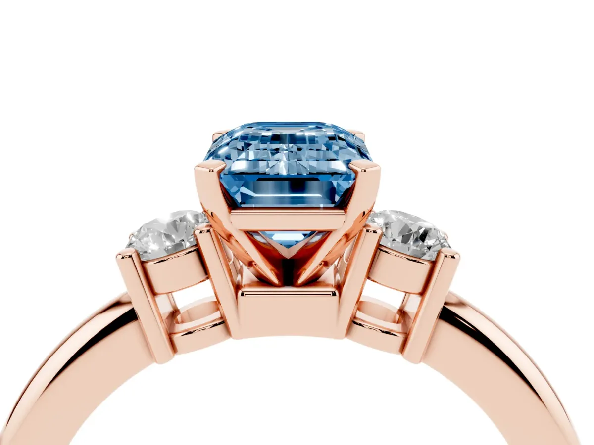 Fancy Blue Three-Stone Emerald Cut Cut Diamond Solitaire with Prong Setting and Classic Band Rose gold