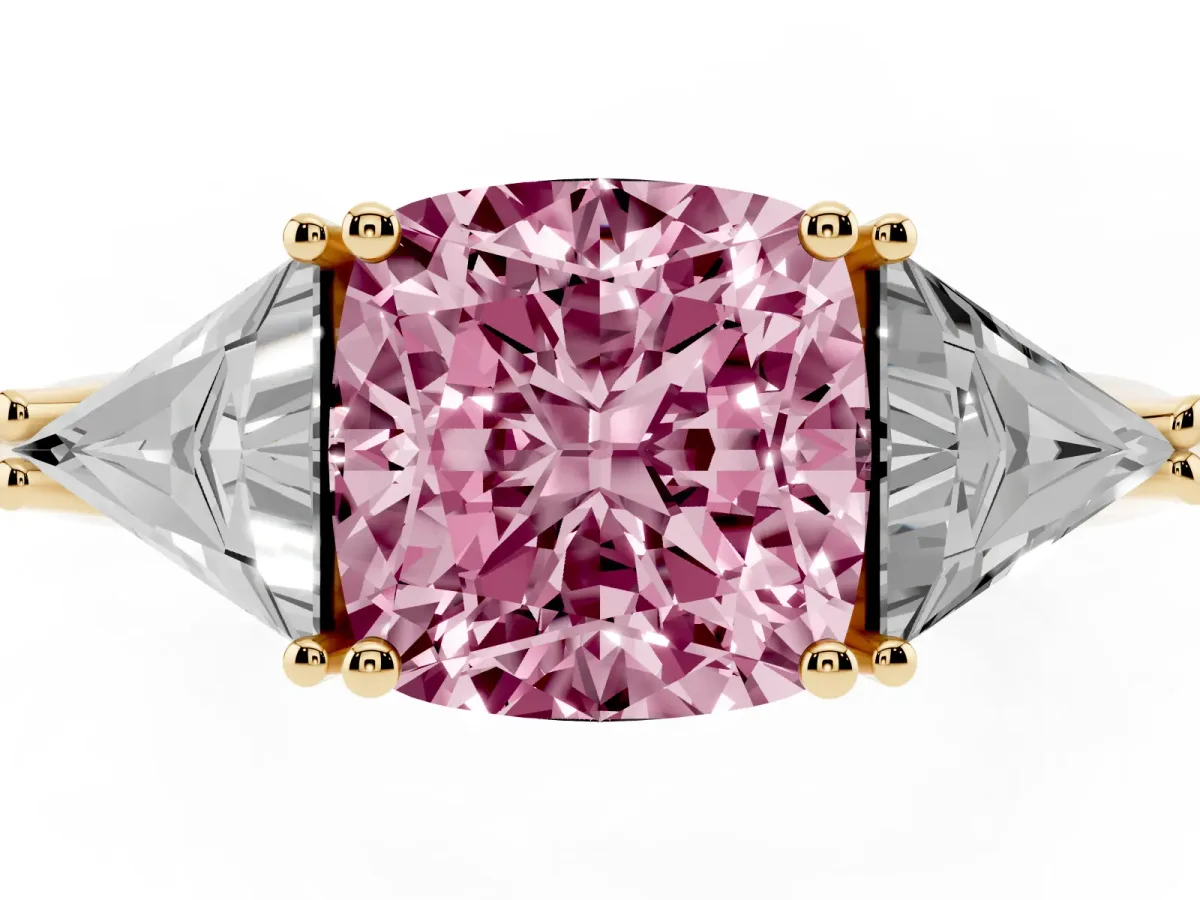 Fancy Pink Three-Stone Cushion Cut Diamond Engagement Ring with Trillion Side Stones and Prong Setting Yellow gold