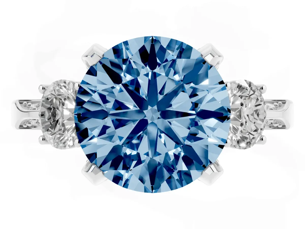 Fancy Blue Round Cut Brilliant Three-Stone Diamond Ring with Pavé Band and Four-Prong Setting Silver