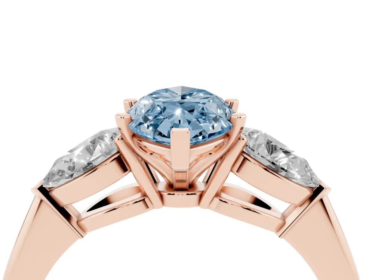 Fancy Blue Three-Stone Marquise Cut Diamond Ring with Pear Side Stones and Four-Prong Setting Rose gold