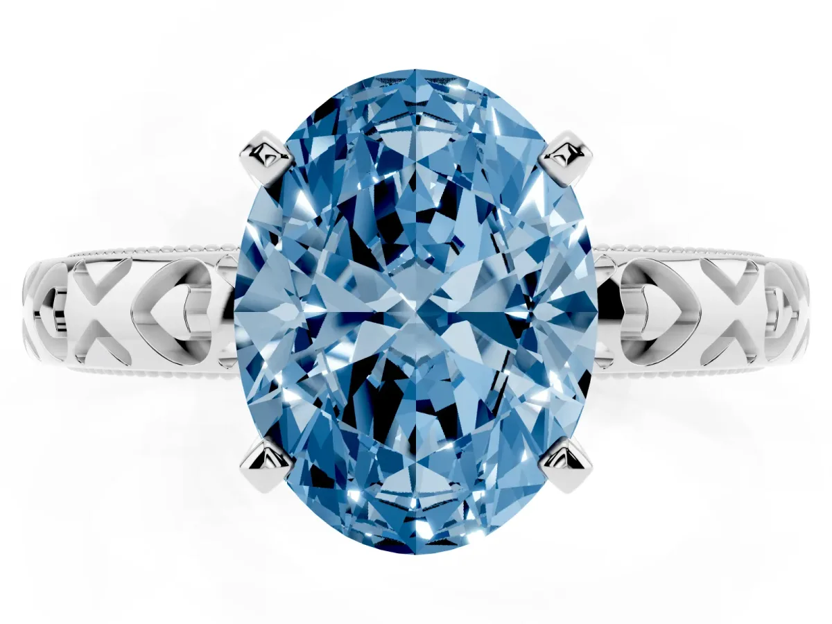Fancy Blue Oval Cut Solitaire Diamond Engagement Ring with XO Engraved Band and Four-Prong Setting Silver