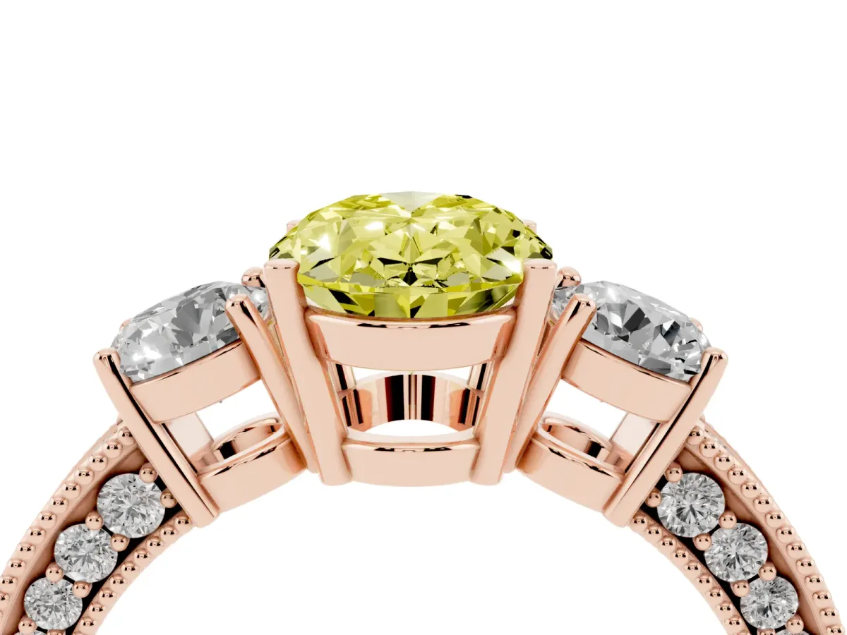 Fancy Yellow Oval Cut Three-Stone Diamond Ring with Pavé Band and Four-Prong Setting Rose gold