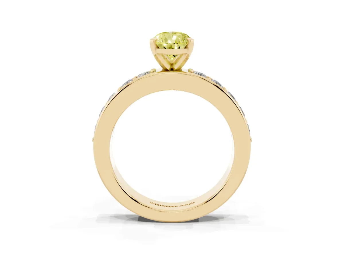 Fancy Yellow Pear Cut Diamond Engagement Ring with Channel Set Round Band and Prong Setting Yellow gold