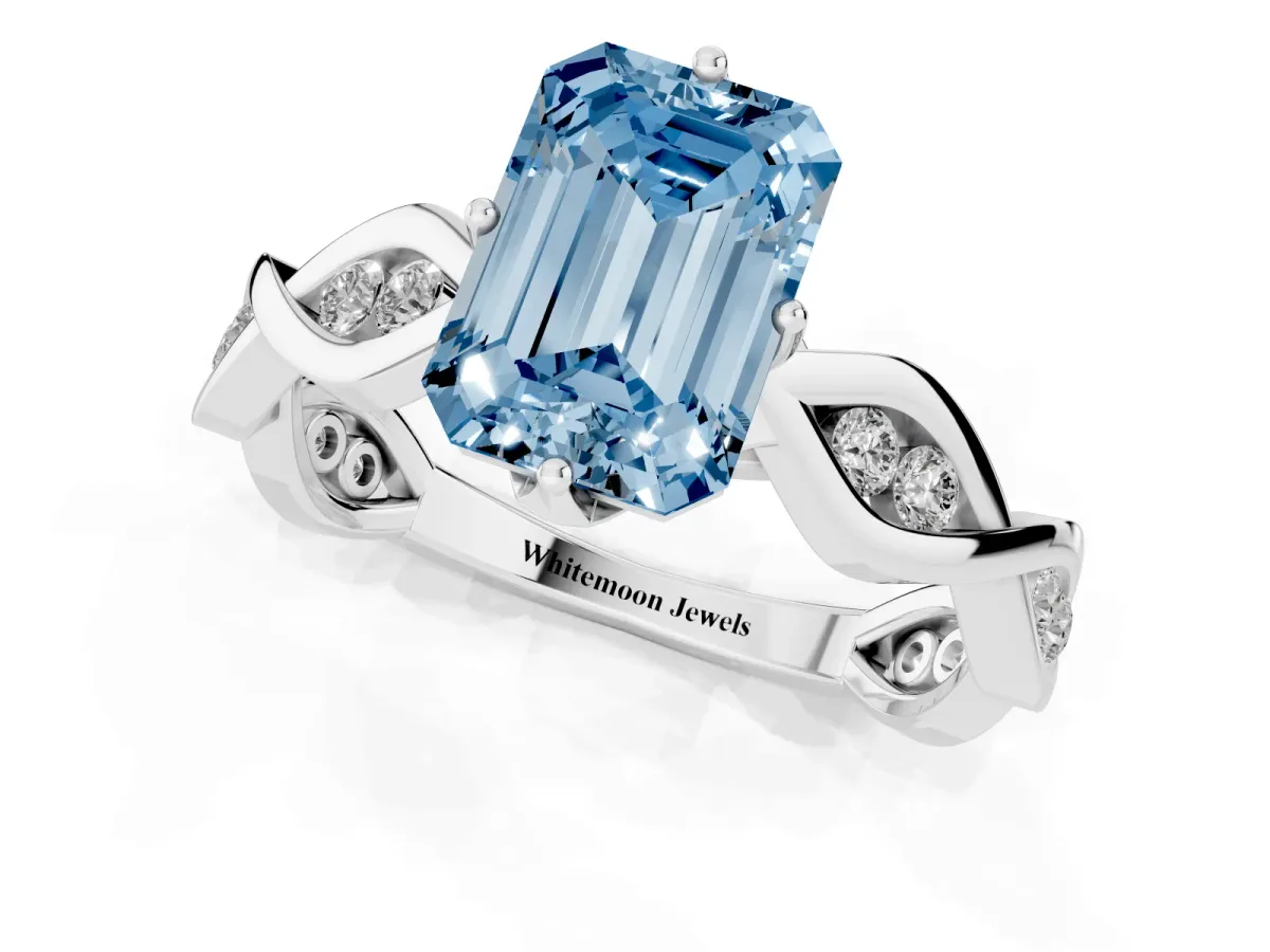 Fancy Blue Emerald Cut Solitaire Twist Band with Leaf Prong Setting Platinum