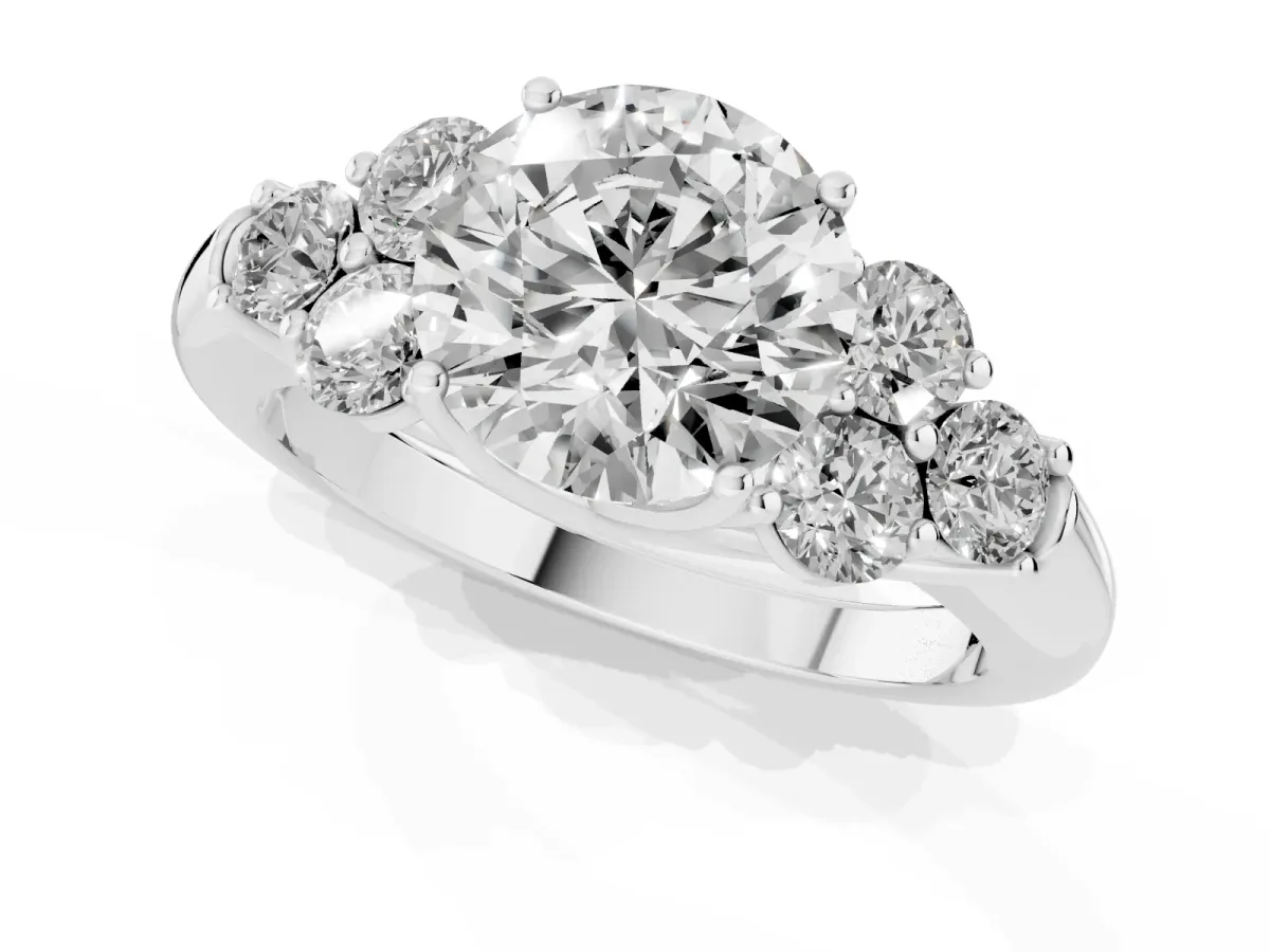 Round Cut Cut Diamond Cluster Ring with Round Accent Stones and Prong Setting on a Classic Band Silver