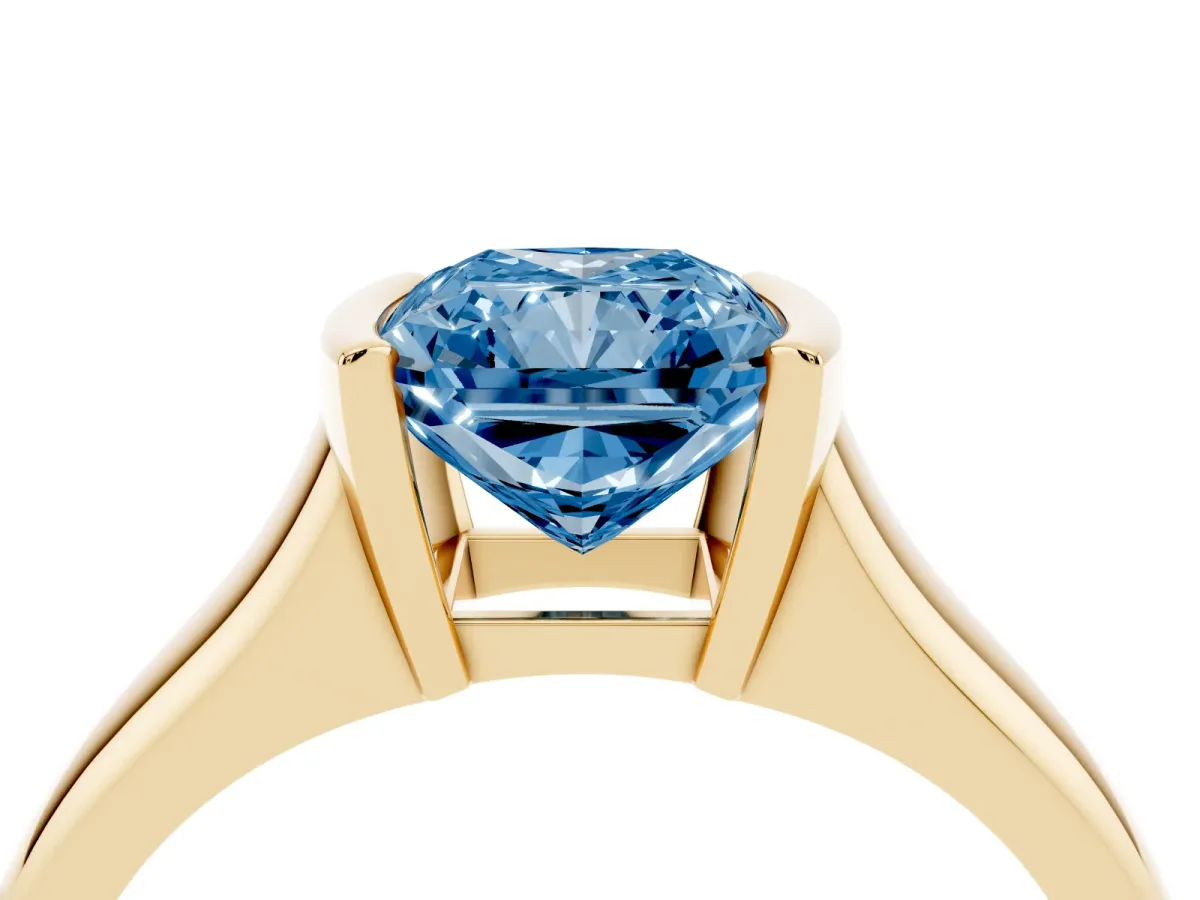 Fancy Blue Radiant Cut Solitaire Tension Set Diamond Ring with Split Shank Band Yellow gold