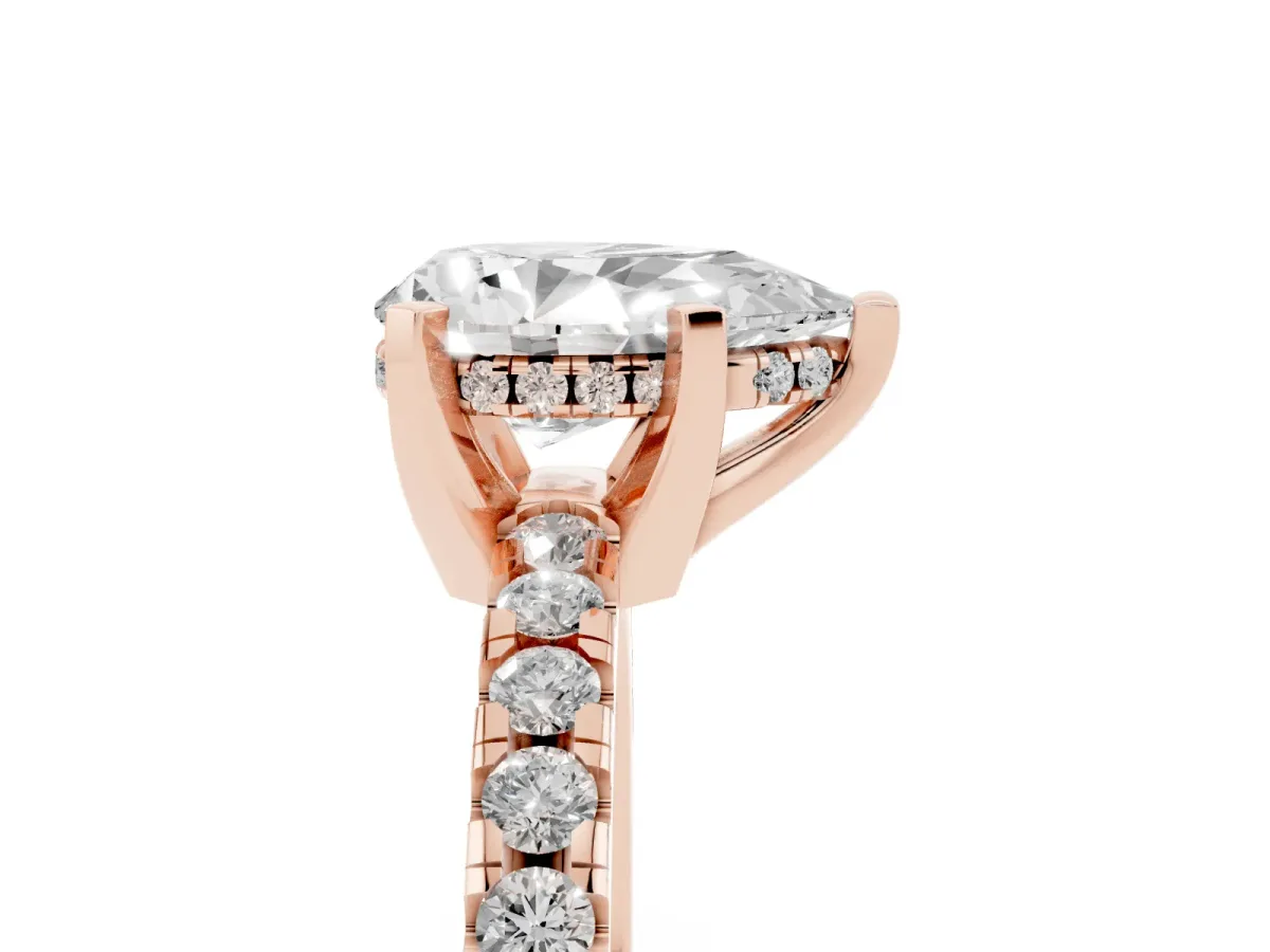 Pear Cut Diamond Solitaire Ring with Round Pavé Band and Four-Prong Setting Rose gold