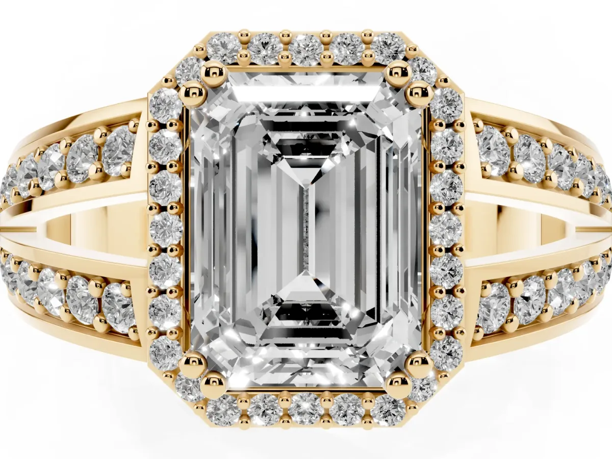 Emerald Cut Diamond Halo Ring with Split Shank Pavé Band and Four-Prong Setting Yellow gold