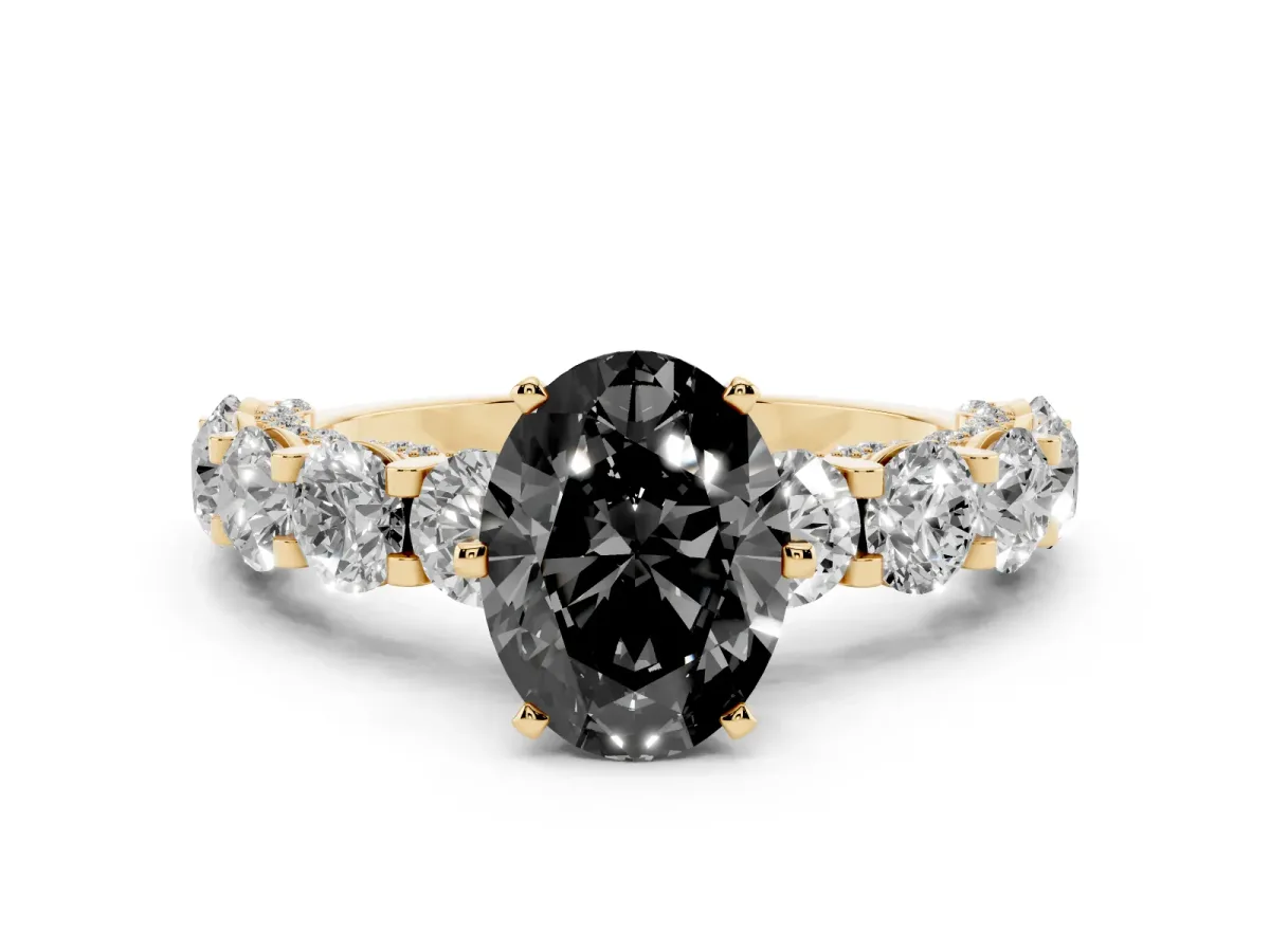 Fancy Black Oval Cut Diamond Side Stone Engagement Ring with Four-Prong Setting Yellow gold