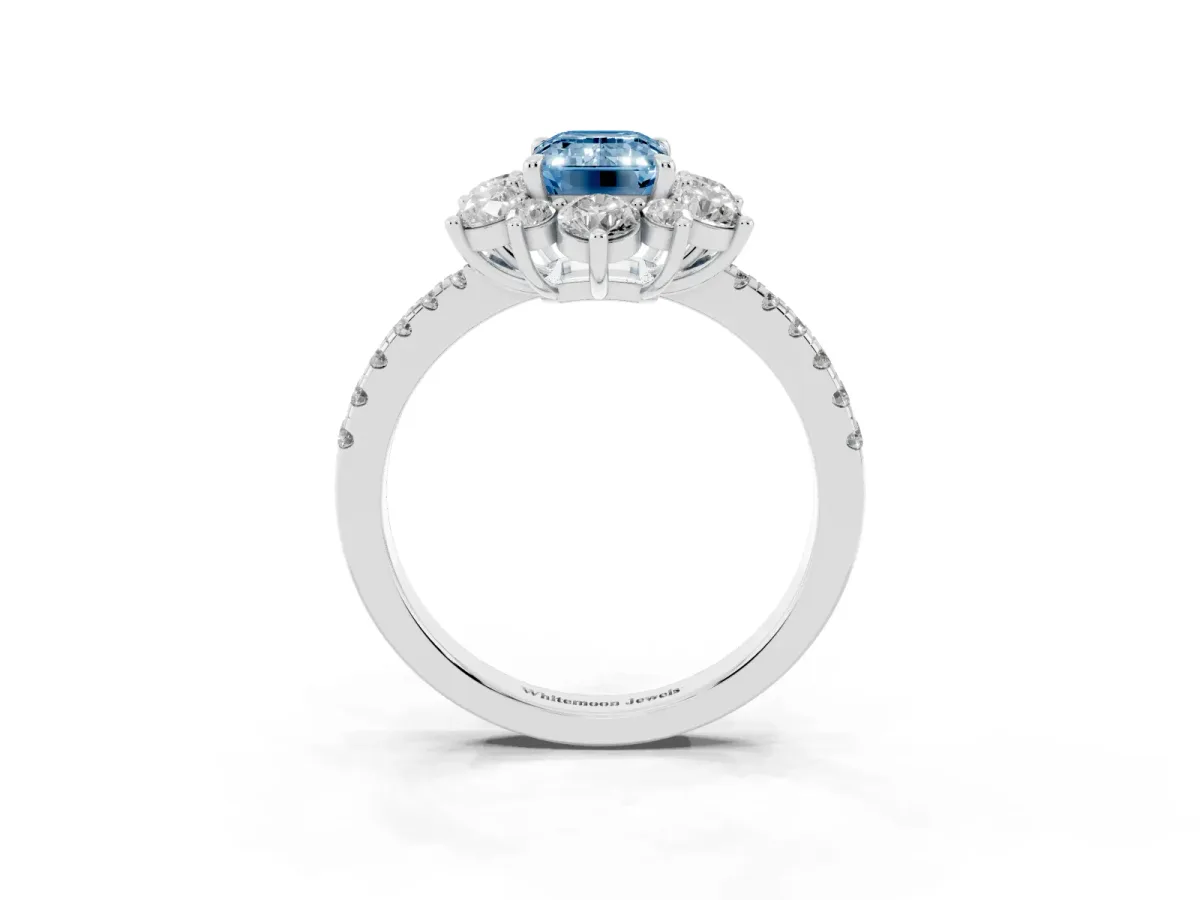 Fancy Blue Emerald Cut Diamond Floral Halo Ring with Round Pavé Band and Prong Setting Silver