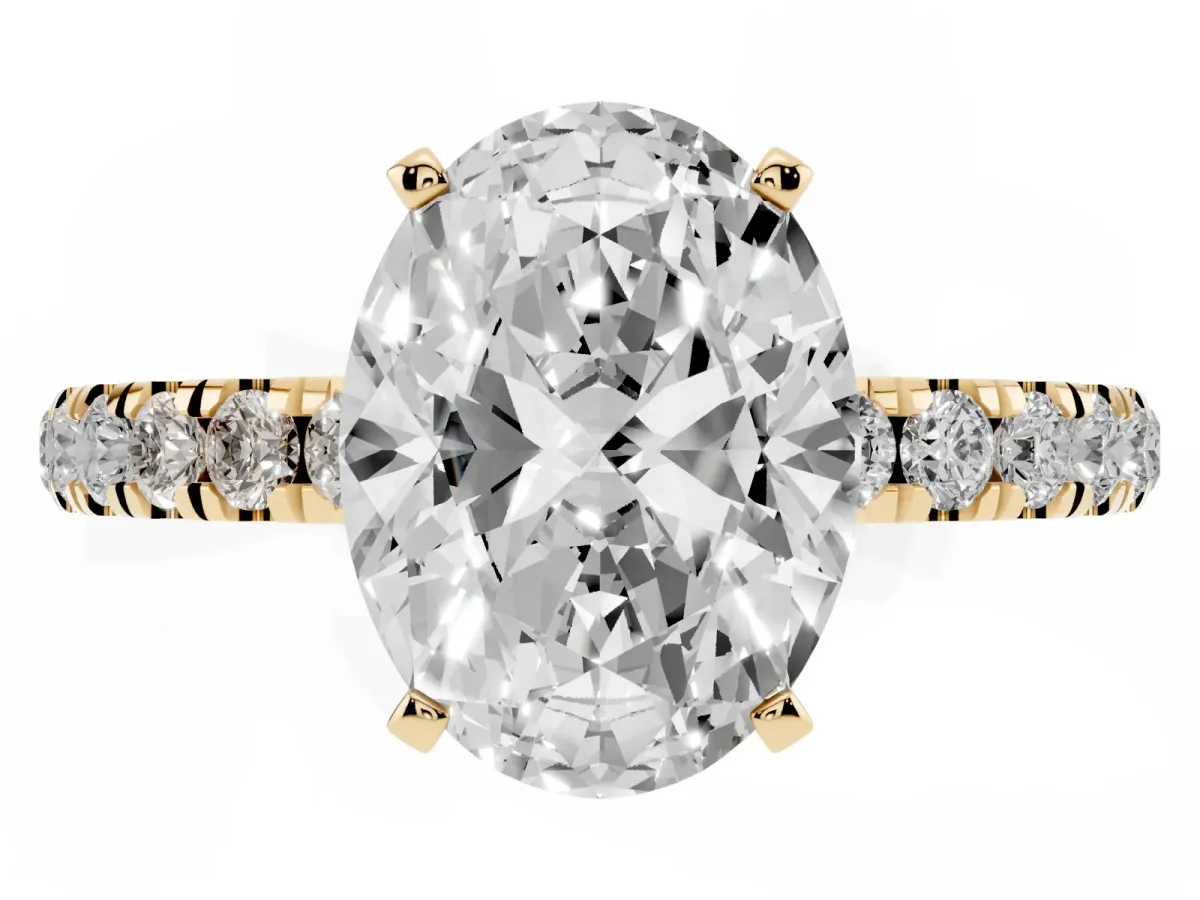 Oval Cut Diamond Solitaire Ring with Pavé Accents and Four-Prong Setting Yellow gold