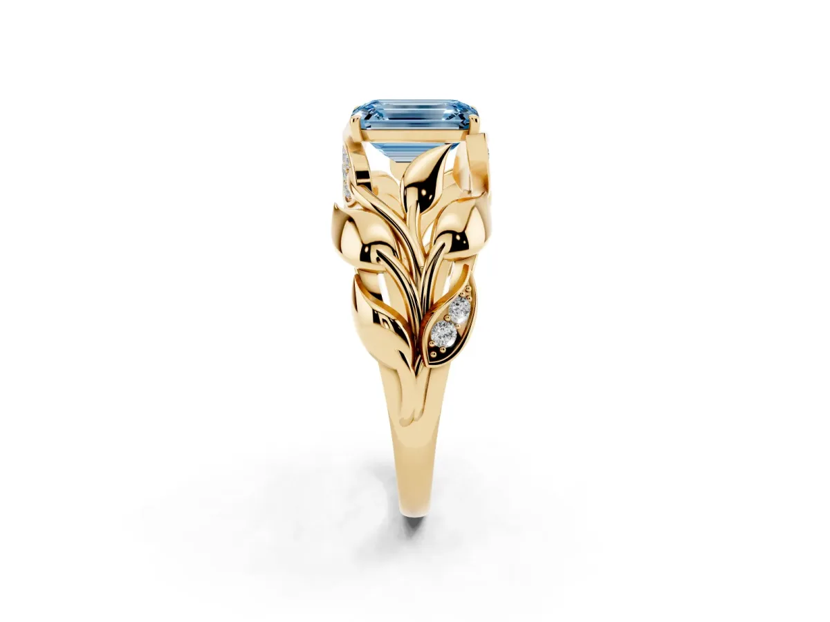 Fancy Blue Emerald Cut Diamond Leaf-Inspired Engagement Ring with Round Accents and Prong Setting Yellow gold