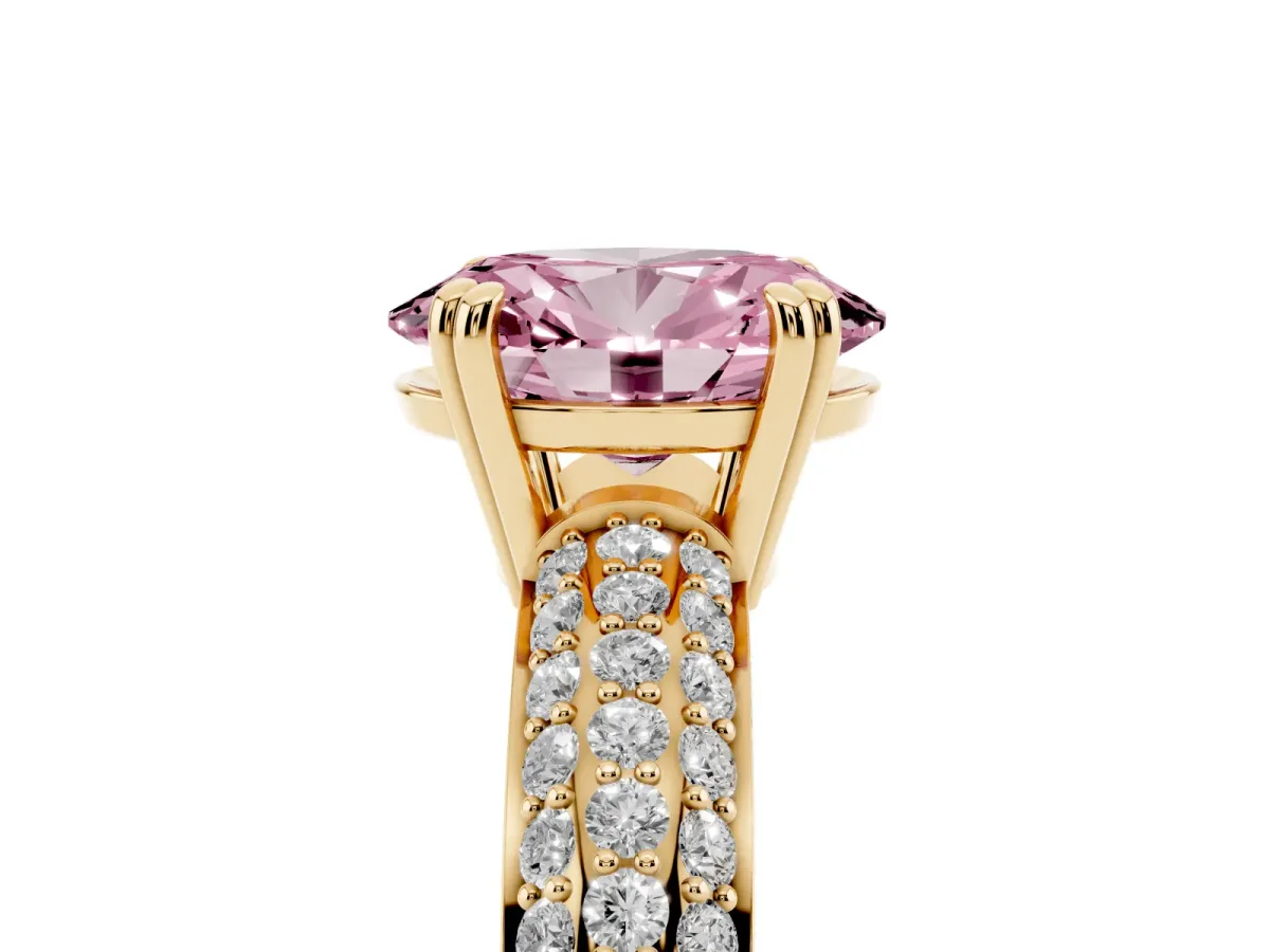 Fancy Pink Oval Cut Diamond Solitaire Ring with Multi-Row Round Pavé Band and Prong Setting Yellow gold