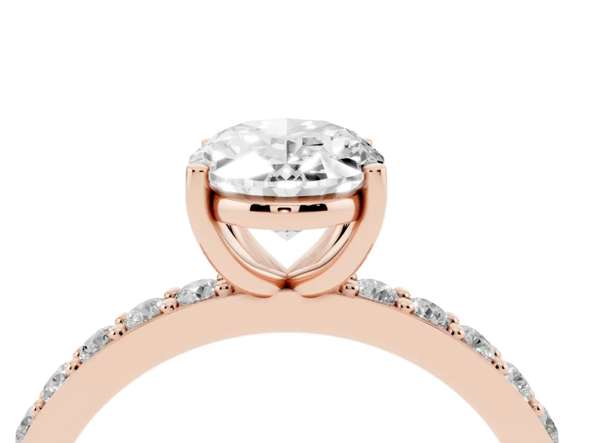 Oval Cut Cut Diamond Solitaire with Pave Band and Four-Prong Setting Rose gold