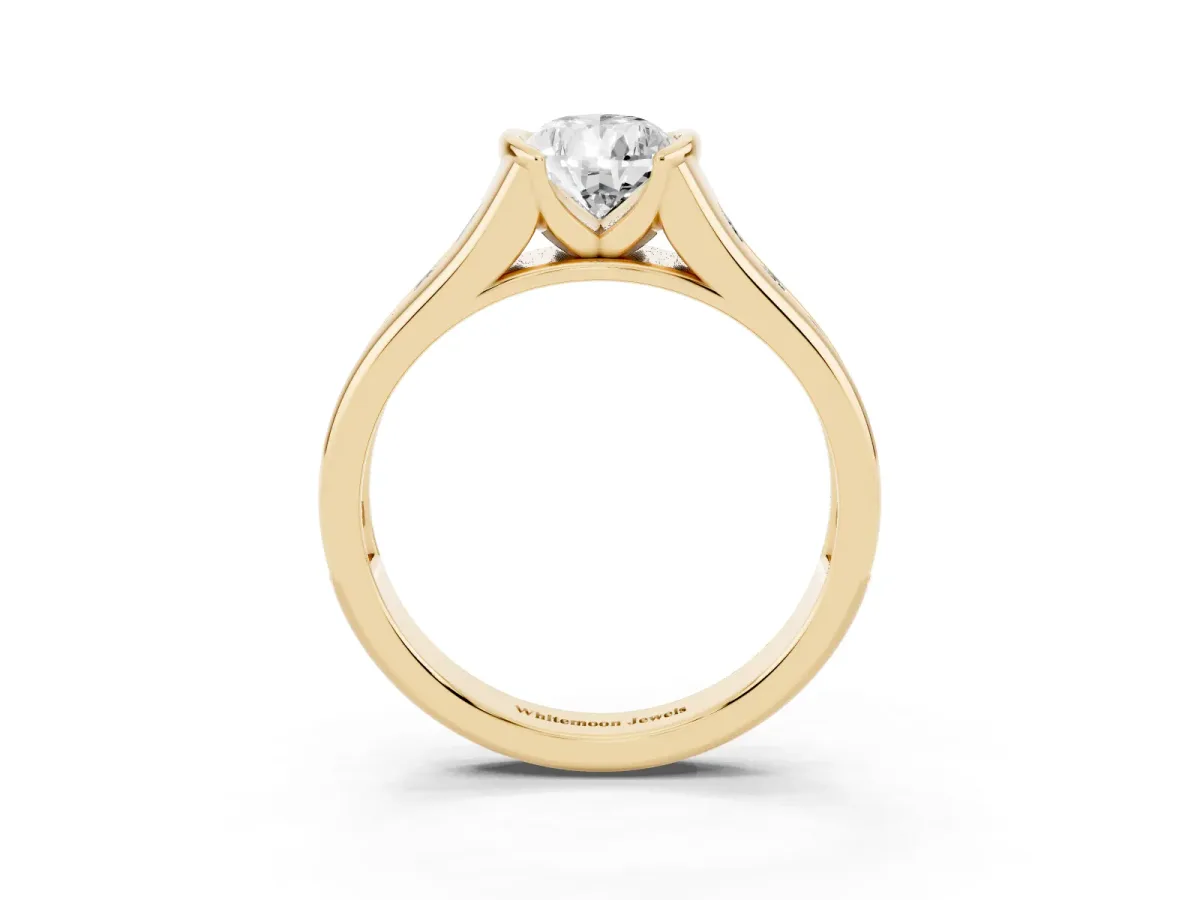 Pear Cut Solitaire Bezel-Set Diamond Ring with Channel-Set Band Yellow gold