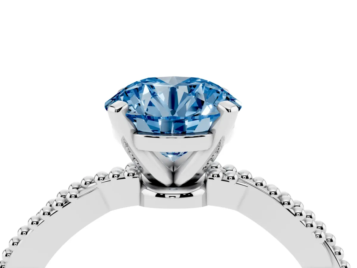 Fancy Blue Round Cut Solitaire Twisted Band with Bead Prong Setting Silver